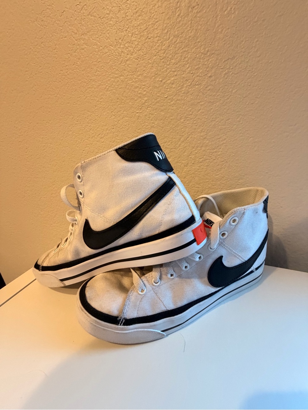 Nike Kids White and Black High-Top Sneakers with Red Heel Accent